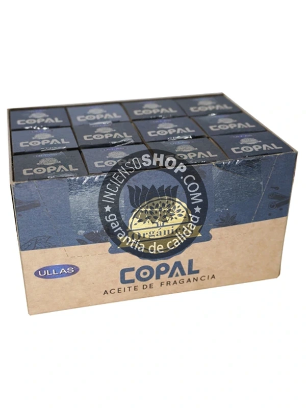 Aceite Copal de Ullass caja abierta aroma místico y ceremonial, mostrando el envase de aceite, ideal para limpieza energética, protección y para crear un ambiente de alta vibración durante la meditación o rituales.