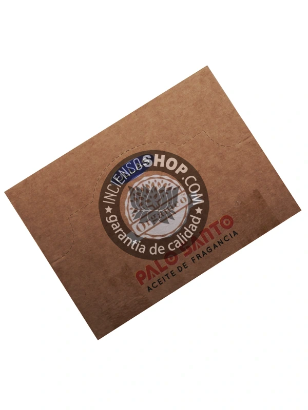 Aceite Palo Santo de Ullass caja vista cenital aroma limpio y energizante de palo santo conocido por sus efectos calmantes y su capacidad para neutralizar energías negativas perfecto para aromaterapia y rituales de limpieza