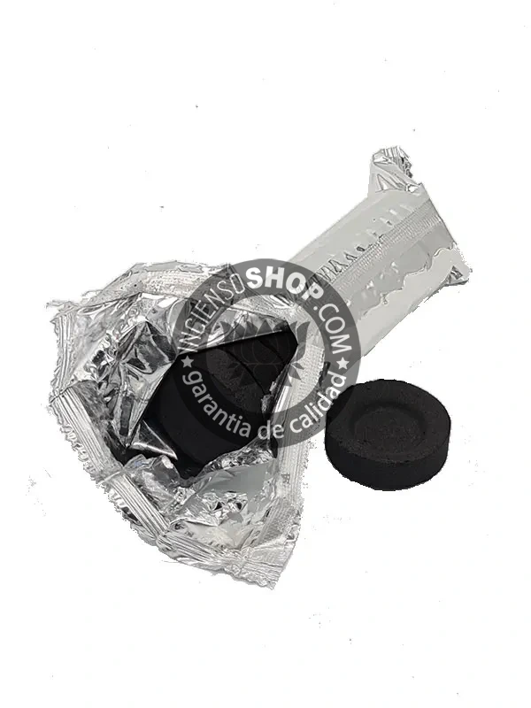 Pastilla de carbón número 2 forma de caracola ideal para quemar resinas y sahumerios en rituales de purificación energética meditación y ceremonias espirituales